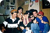 Hanging out with friends in my apartment in Kushiro, the small fishing and mining town where I lived for a year. All hats and sunglasses pictured are the property of the author. Photographer unknown