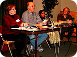 The panelists (l to r): Patricia
Waak, Charles Phillips, Urmila Panthi, Moderator Eric Hadley-Ives