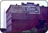 faded Switzer's wall advertisement