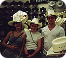True to Texas - me with some Texas friends the day I broke down and bought a cowboy hat